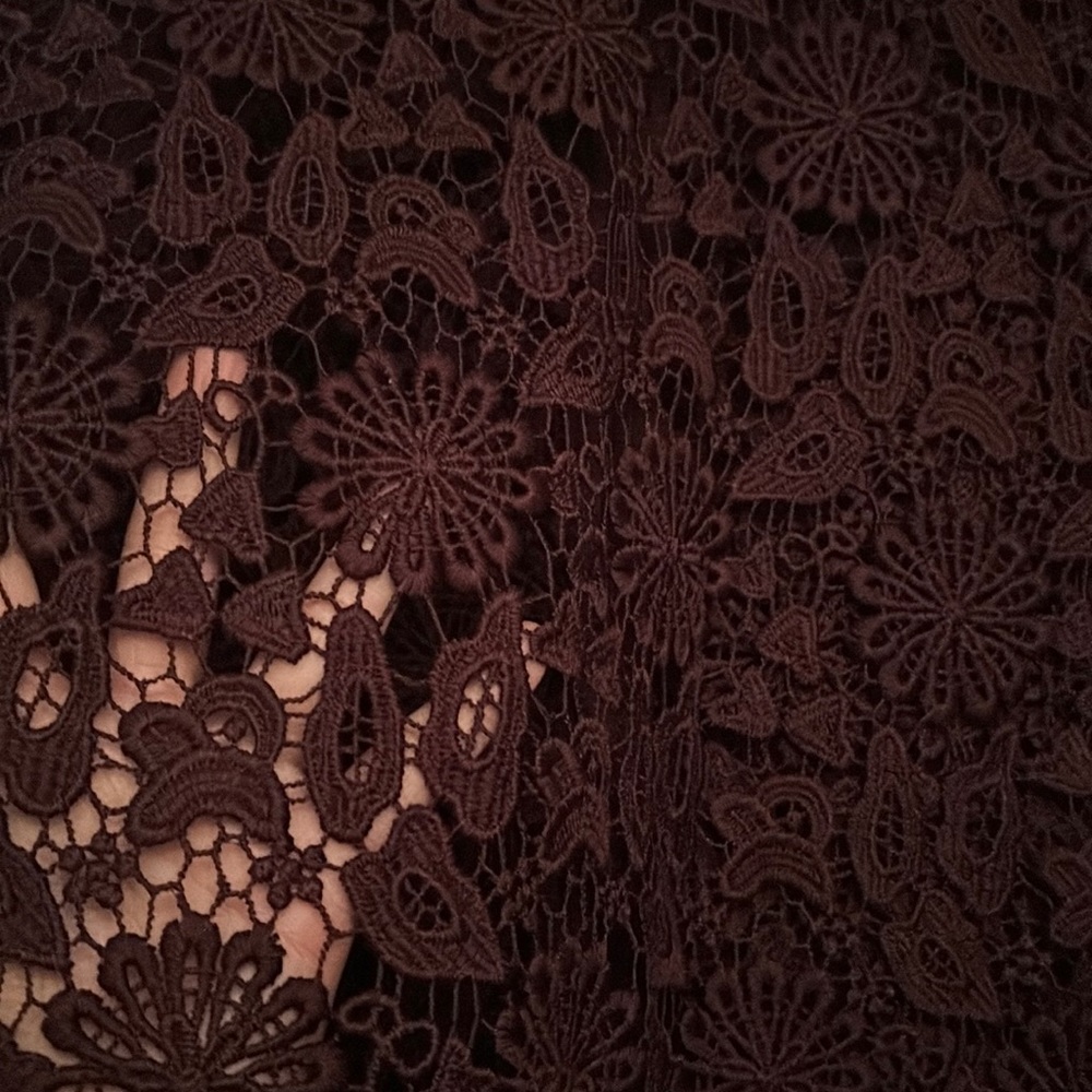 Gorgeous burgundy set! New with no tags. Bought it never wore it.Top S & skirt 4